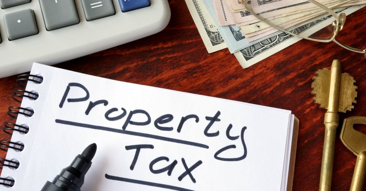 A notepad with the words 'property tax'